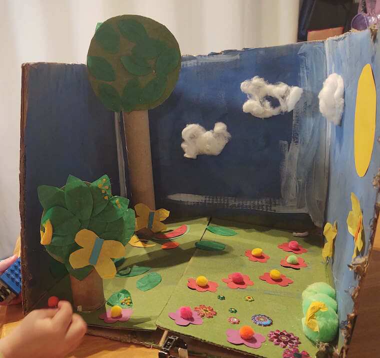butterfly life cycle play craft with hand